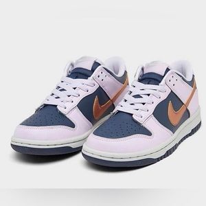 Brand new. Thunder Blue/Metallic Copper nike dunks. Women’s size 8.